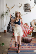 Load image into Gallery viewer, Blue seamless lace racerback bralette with soft and stretchy fabric.