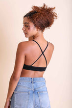 Load image into Gallery viewer, Lightweight feminine crochet lace high neck black bralette.