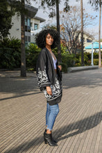 Load image into Gallery viewer, Breathable embroidered black kimono for layering and comfort.
