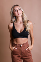 Load image into Gallery viewer, Delicate lace racerback black bralette with seamless and breathable fit.
