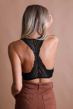 Load image into Gallery viewer, Feminine lace seamless black bralette, perfect for versatile styling.
