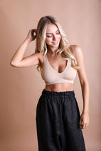 Load image into Gallery viewer, Lightweight wireless lace beige bralette with racerback design.
